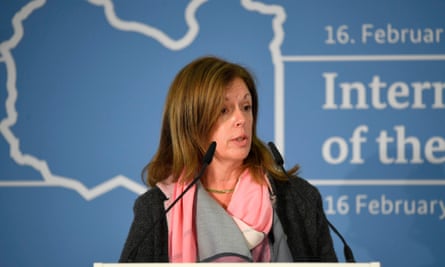 Williams at press conference in front of map of Libya