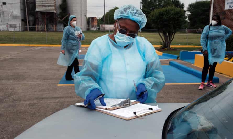 Medical workers with Delta health center prepare to vaccinate people at a pop-up Covid-19 vaccination clinic in Leland, Mississippi, a rural Delta community.