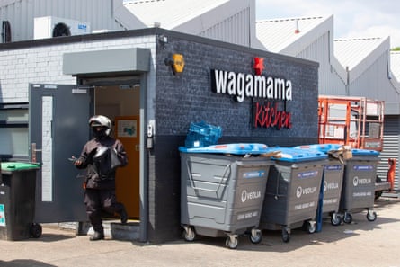 A delivery rider at a dark kitchen in south London