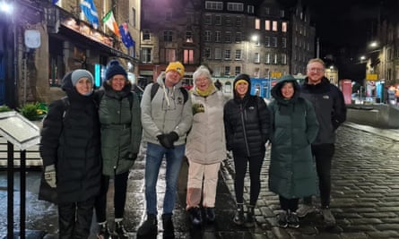 Angus Stirling (third from left) guides a walking tour in Edinburgh