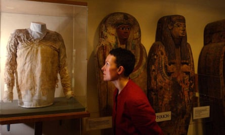 A person looks at a display of the Tarkhan dress