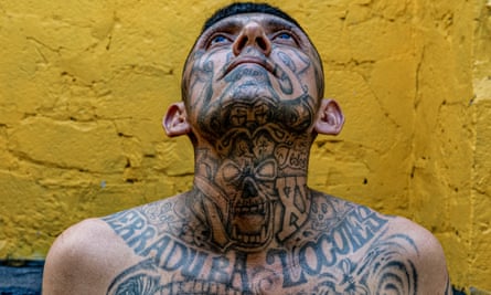 Elias (35), a member of La 18, stands for a portrait at the Penal San Francisco Gótera, El Salvador.