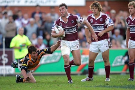 Terry Hill with the ball as the Sea Eagles take on Wests Tigers