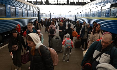 People arrive at the central train station from Pokrovsk, in the eastern part of Ukraine on April 11, 2022 in Lviv, Ukraine.