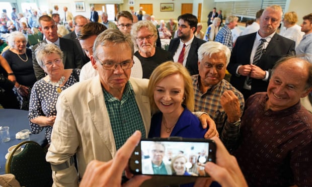 Liz Truss has her picture taken with supporters at an event in Ludlow.