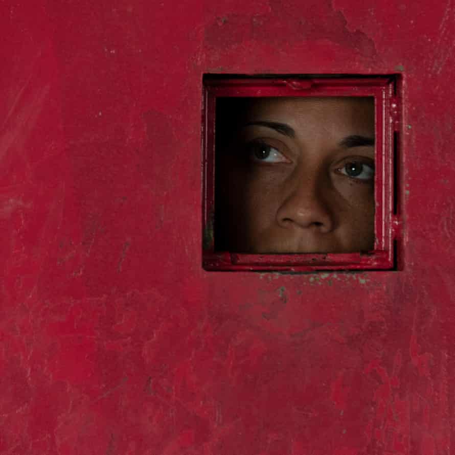 Sharon, 38, waits in her cell for the police to enter to count the prisoners