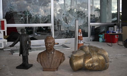 Smashed windows and vandalised sculptures at the supreme court building in Brasília on Tuesday after Bolsonaro supporters raided federal buildings.