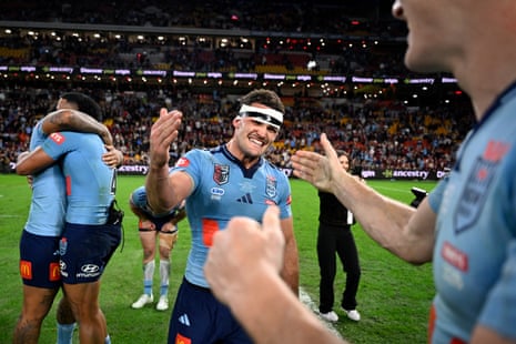 Nathan Cleary and teammates soak in the victory.