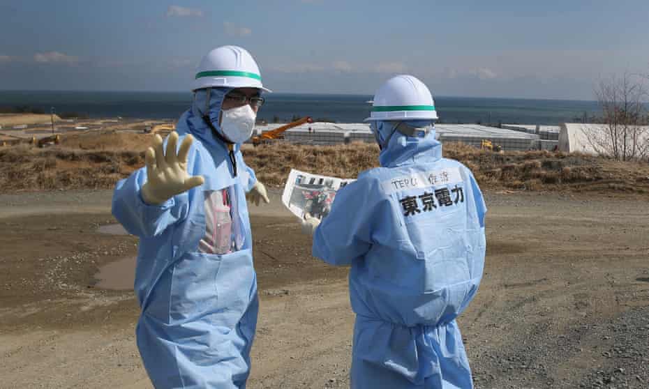 Contamination experts work at the site of the Fukushima disaster. 