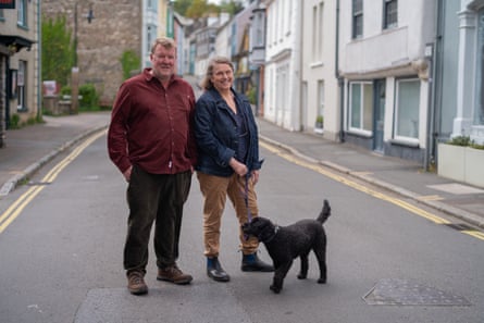 Alex Murdin, Sophie Pierce and a dog stand in an empty street
