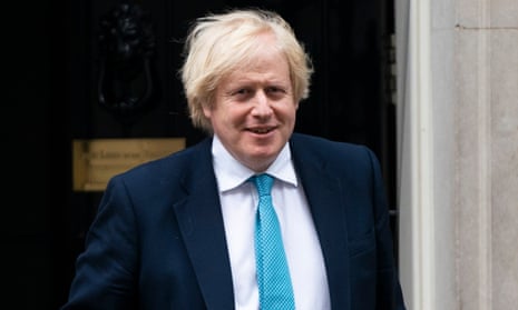 Boris Johnson on his way to parliament to announce the scrapping of DfID.