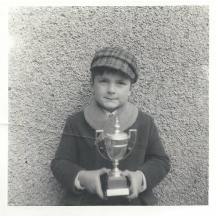 Stephen Hough aged eight, with a trophy won in a local music competition.