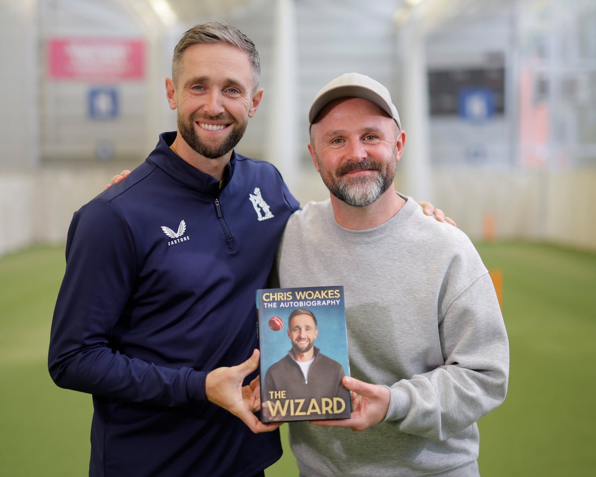 Chris Woakes, the Warwickshire and former England cricketer, with Ali Martin cricket correspondent of , holding the autobiography they have just written together