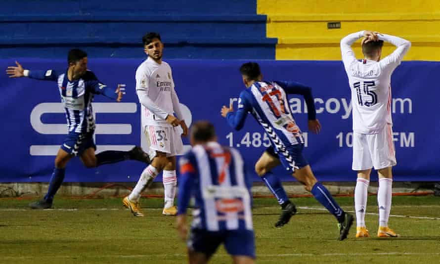 Alcoyano’s midfielder Juanan Casanova (left) celebrates after scoring his side’s Spanish Cup winner against Real Madrid.