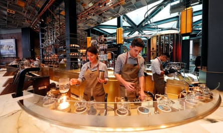 Employees prepare coffee inside the new Starbucks Reserve Roastery flagship in downtown Milan, Italy, September 4, 2018. Picture taken September 4, 2018. REUTERS/Stefano Rellandini