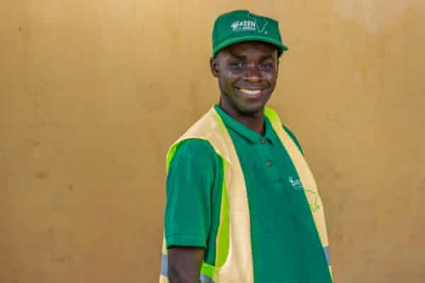 Divin Kouebatouka, wearing a Green Tech Africa shirt and cap