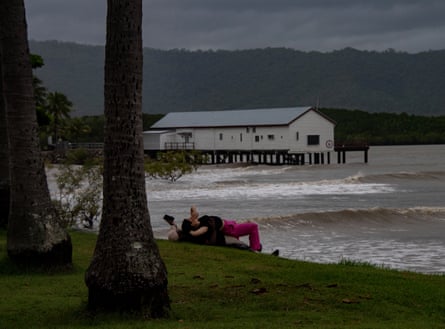 Tropical Cyclone Narelle barrels west after ripping off roofs and downing trees in far north Queensland