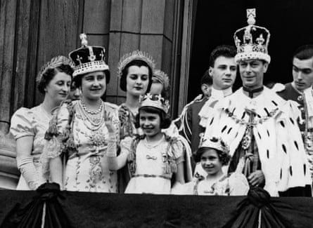 King George VI after the coronation ceremony with his wife Queen Elizabeth and daughters Elizabeth and Margaret