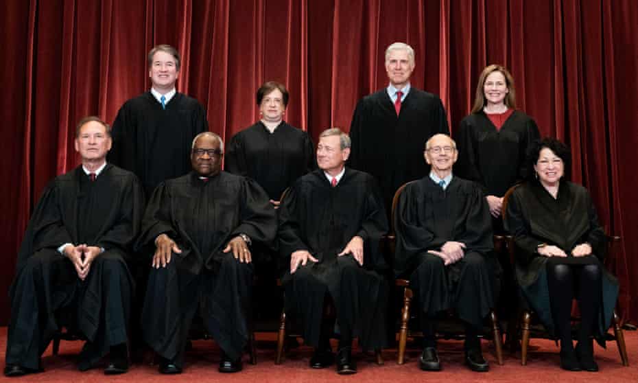 The US supreme court (left to right from back): Brett Kavanaugh, Elena Kagan, Neil Gorsuch, Amy Coney Barrett, Samuel Alito, Clarence Thomas, John Roberts, Stephen Breyer and Sonia Sotomayor.