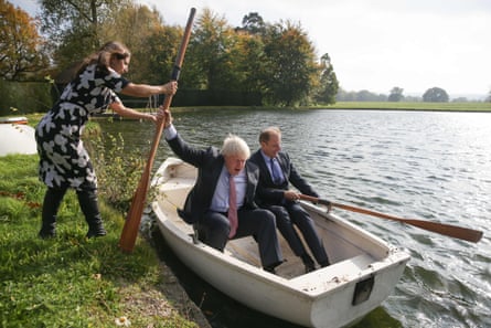 Lawyer and Johnson’s wife, Marina Wheeler (left), helps as the then foreign secretary boards a rowing boat with the Czech Republic’s deputy foreign minister, Ivo Sramek.