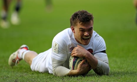 England's George Furbank celebrates after scoring the opening try against Scotland.