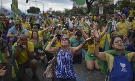 Supporters of outgoing Jair Bolsonaro gather in Rio de Janeiro on Tuesday. Truck drivers have threatened a new protest in support of the defeated president.