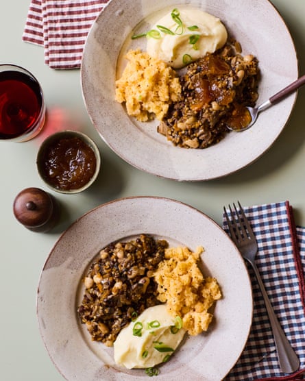 Ali Stoner’s vegetarian haggis on plates with neeps and tatties, drinks and other items on the table