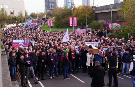 West Ham fans carry a coffin in protest at the club’s owners, prior to their match with Burnley at London Stadium.