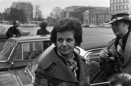 Truus Postma getting out of a car