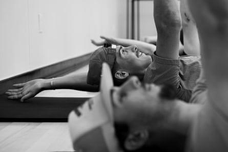 Men stretching successful an excercise studio