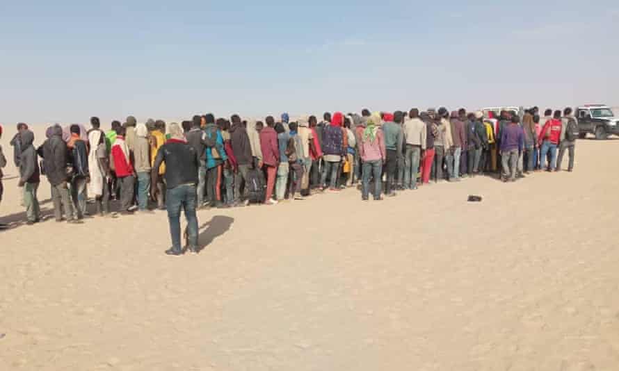 Migrants who were dumped in the desert near the Libyan border.
