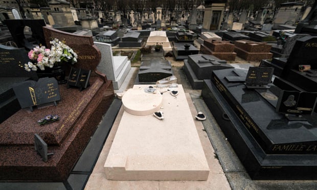 The vandalised grave of US artist Man Ray.