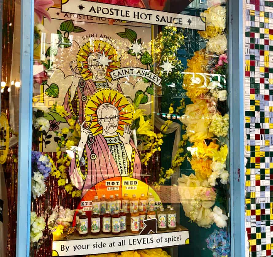 A ‘shrine’ to Ashley Bloomfield doubles as an advertisement for hot sauce in a gift shop window in Wellington.