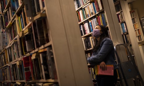 A woman browses in a Brussels bookshop
