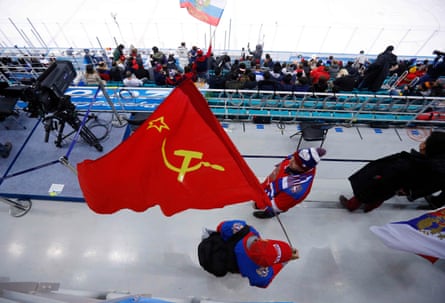 Fans waving a Soviet Union flag before the OAR clash with the USA in the men’s ice hockey