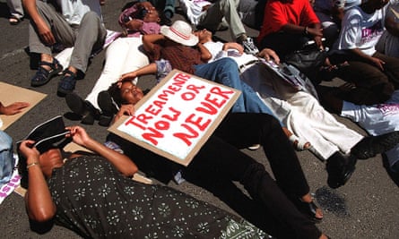 Aids activists stage a ‘die-in’ outside parliament in Cape Town in 2001 during a protest to demand that the government and pharmaceutical companies allow the importation of generic medicines for the treatment of HIV/Aids.