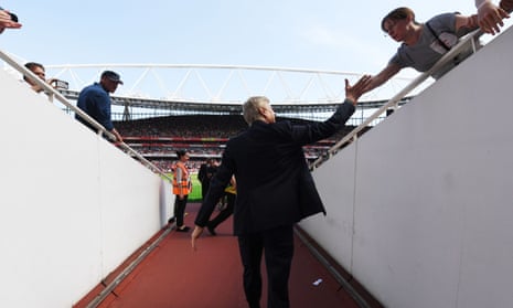 Arsène Wenger gets some positive feedback as he emerges from the tunnel despite the fact that some disgruntled Arsenal fans may be glad to see the back of him.