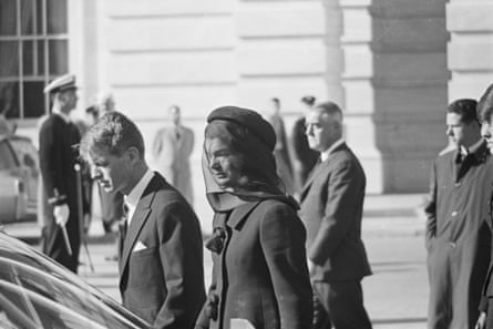 Jacqueline Kennedy walks with her brother-in-law Robert Kennedy during funeral ceremonies for the late president.