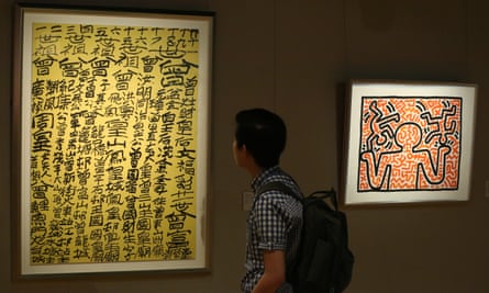 Calligraphy by Tsang Tsou-Choi (left) next to Keith Haring’s Untitled, 1983 at the preview of an auction at Sotheby’s Hong Kong in 2015.