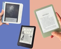 three e-readers against blue and peach background