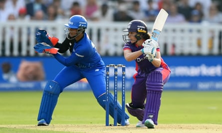 Kate Cross hits a boundary during The Hundred at Lord’s in August.