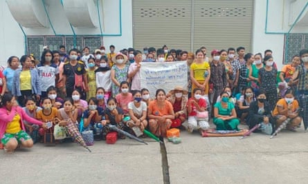 Workers outside the factory.