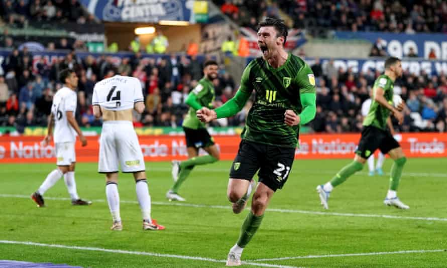 Kieffer Moore celebrates his late leveller for Bournemouth.