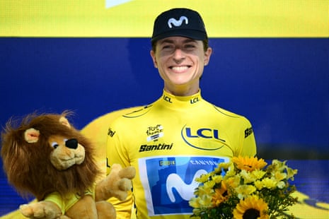 Movistar’s Marlen Reusser celebrates on the podium with the overall leader