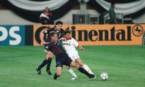 Ronald de Boer tackles Milan’s Marco Simone in the final
