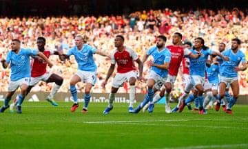 Arsenal and Manchester City players line up as they wait for a cross in the reverse fixture between the sides at the Emirates in October