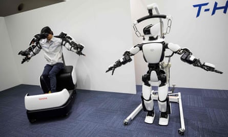 Toyota demonstrates the T-HR3 humanoid robot that will be used during the Games, which aims to be the most innovative ever.