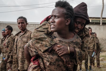 Captive Ethiopian female soldiers arrive at the Mekele Rehabilitation Center in Mekele, the capital of Tigray region, Ethiopia, on July 2, 2021