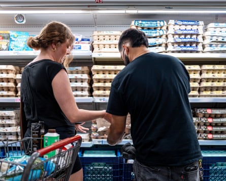Customers inspect eggs astatine a shop successful Texas.
