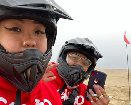 Jackie Nguyen and Jonathan Cortez wearing helmets